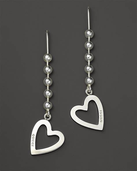 gucci sterling silver heart earrings.